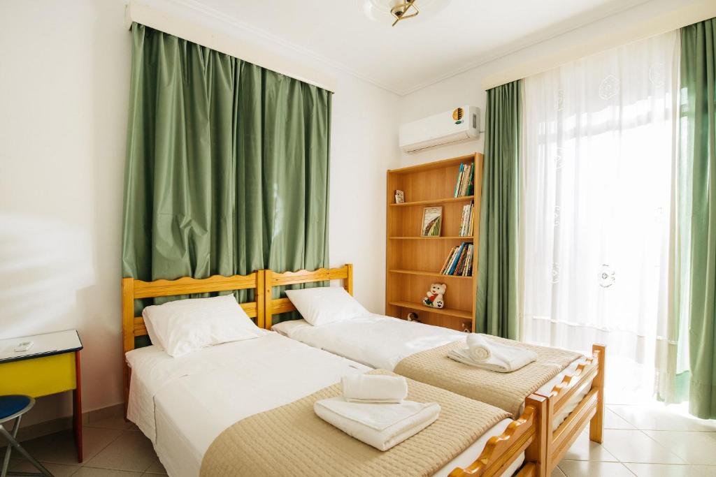 Postel nebo postele na pokoji v ubytování Olive yard house