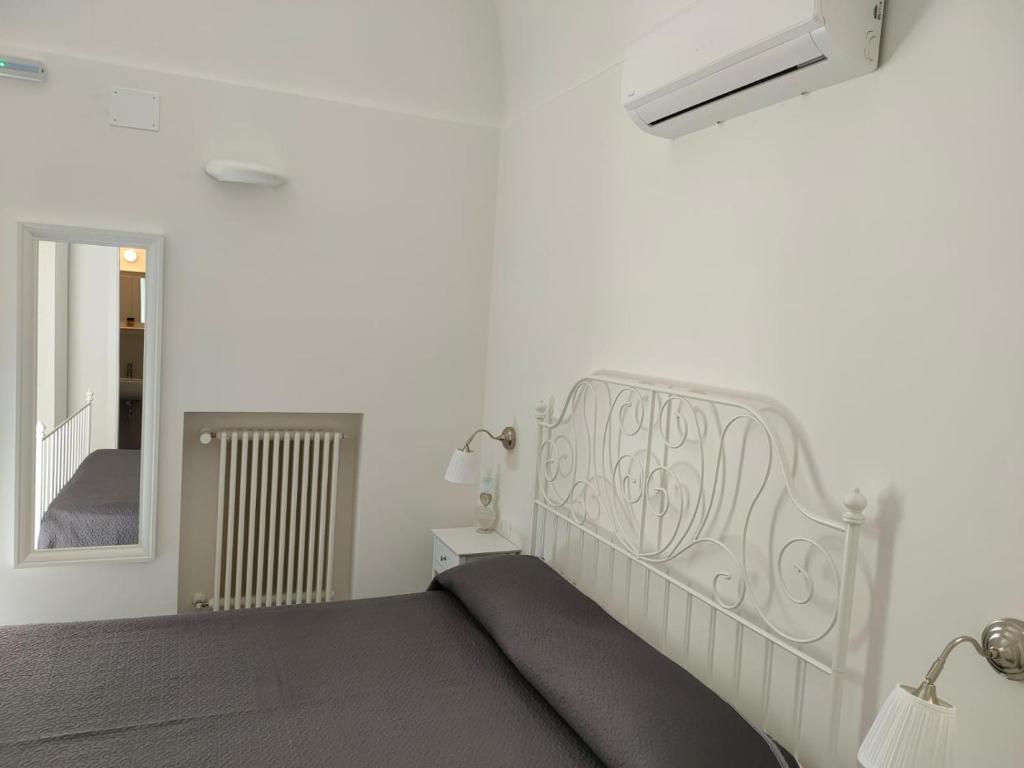 Postel nebo postele na pokoji v ubytování Borgottocento
