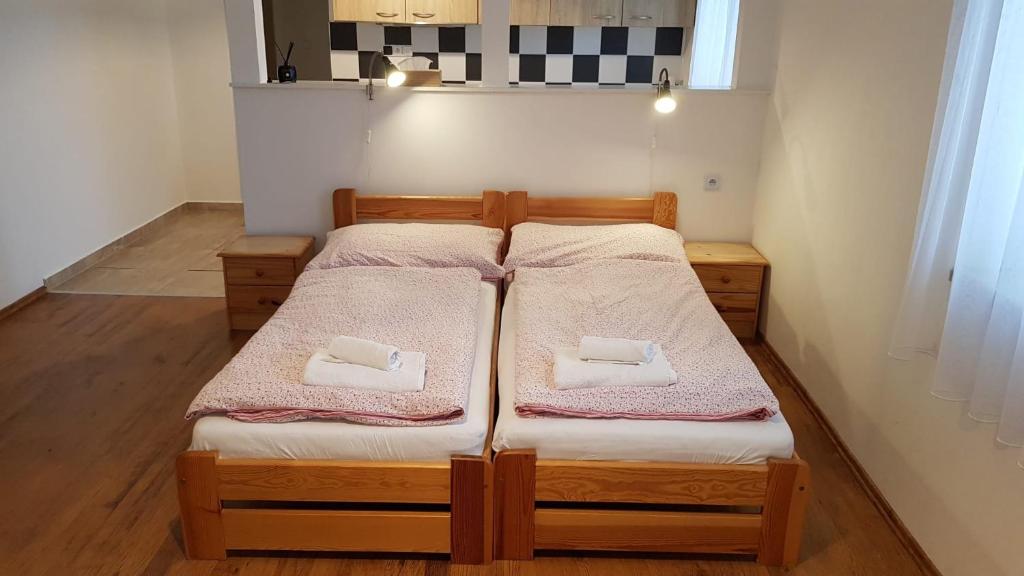 Postel nebo postele na pokoji v ubytování Pension Family