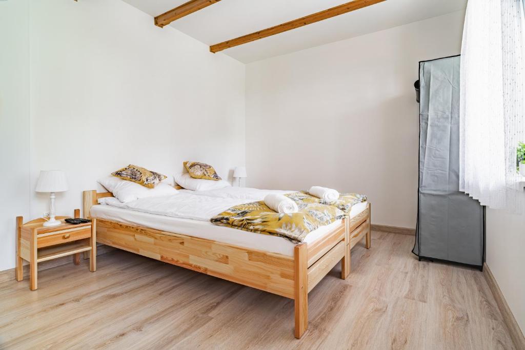 Posteľ alebo postele v izbe v ubytovaní Apartament Dwie Doliny