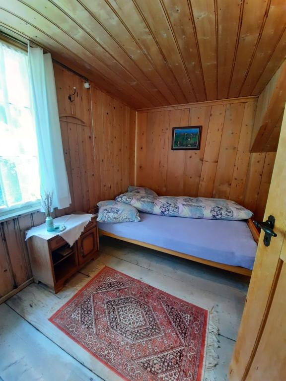 Postel nebo postele na pokoji v ubytování Berggasthaus Obbort