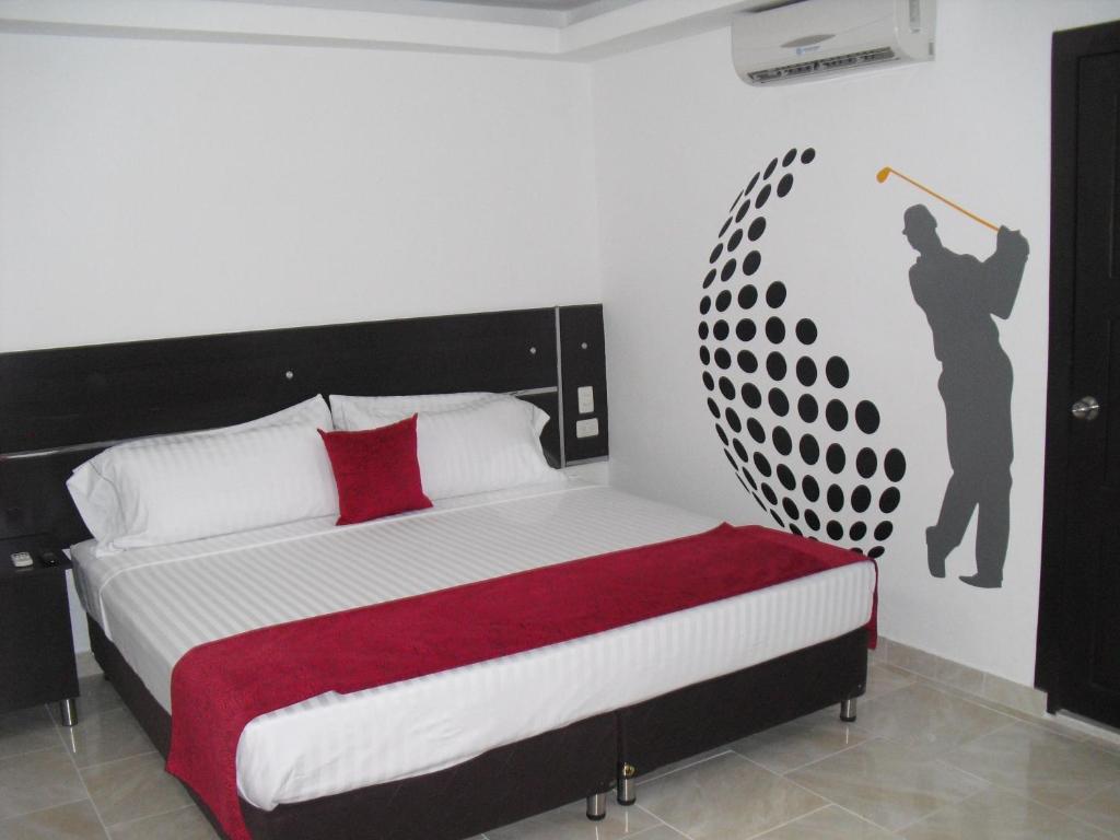 Cama o camas de una habitación en Hotel AW Sport's