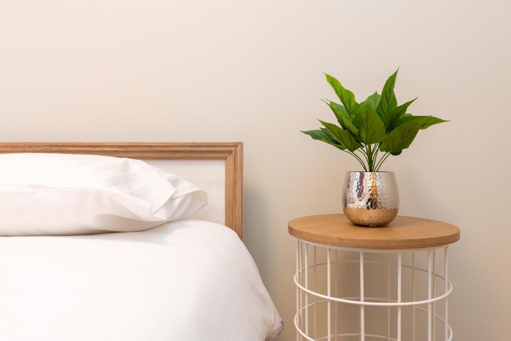 Postel nebo postele na pokoji v ubytování Cozy Foorum Apartment - Tallinn City Centre