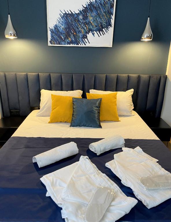 Postel nebo postele na pokoji v ubytování Hotel ULYSSES