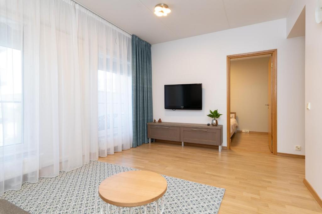 TV a/nebo společenská místnost v ubytování Cozy Foorum Apartment - Tallinn City Centre