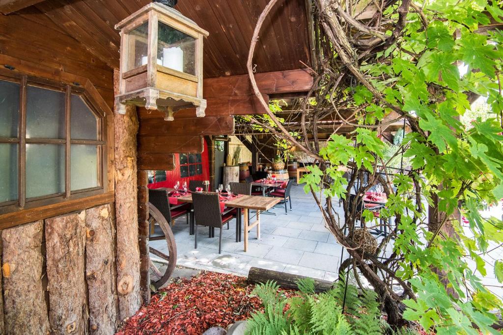 Zahrada ubytování Rêves Gourmands, Hôtellerie & Gastronomie