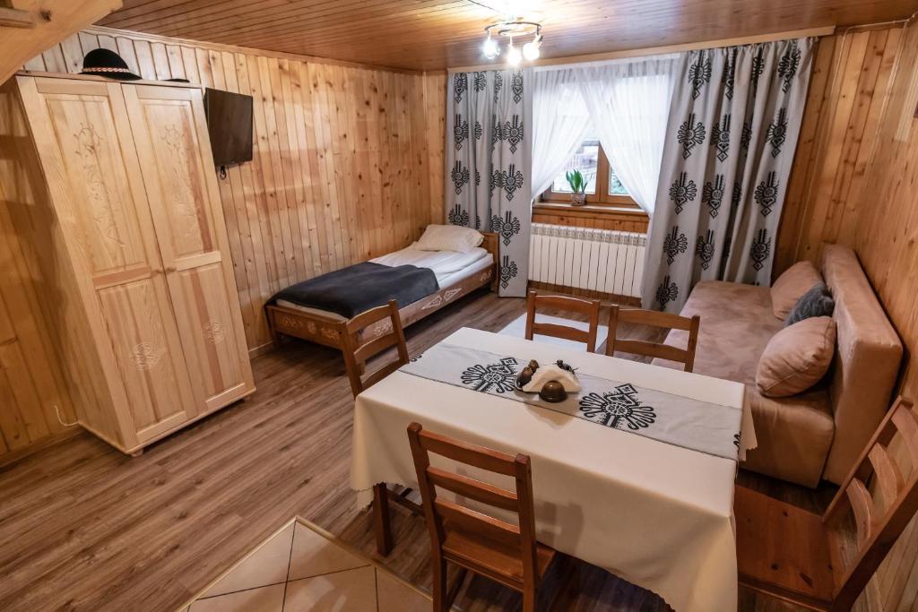 Posteľ alebo postele v izbe v ubytovaní Pokoje u Gronicki