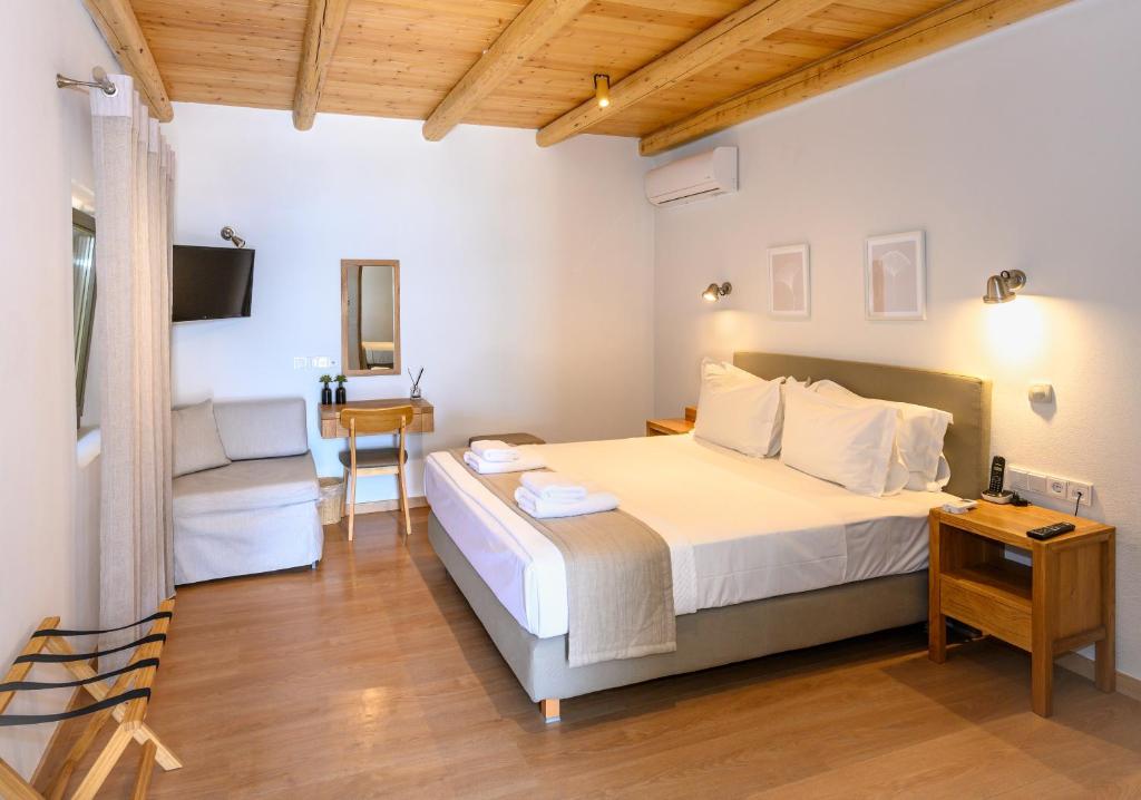 Postel nebo postele na pokoji v ubytování Selinitsa Residence Mani