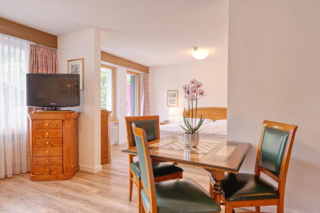 TV a/nebo společenská místnost v ubytování Arca Aparthotel & Spa