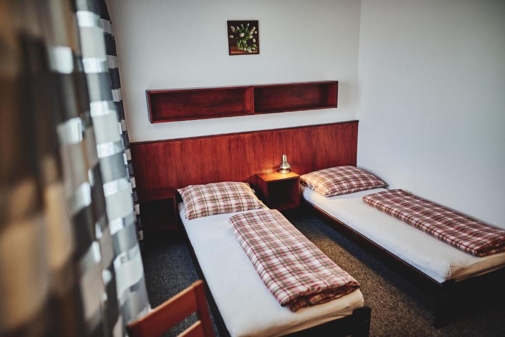 Voodi või voodid majutusasutuse Motel Tošanovice toas