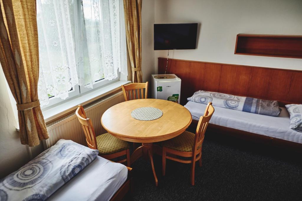 Voodi või voodid majutusasutuse Motel Tošanovice toas