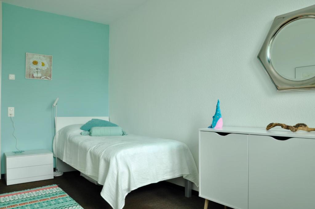 Postel nebo postele na pokoji v ubytování Minusio-Locarno: Navengana Apt.4