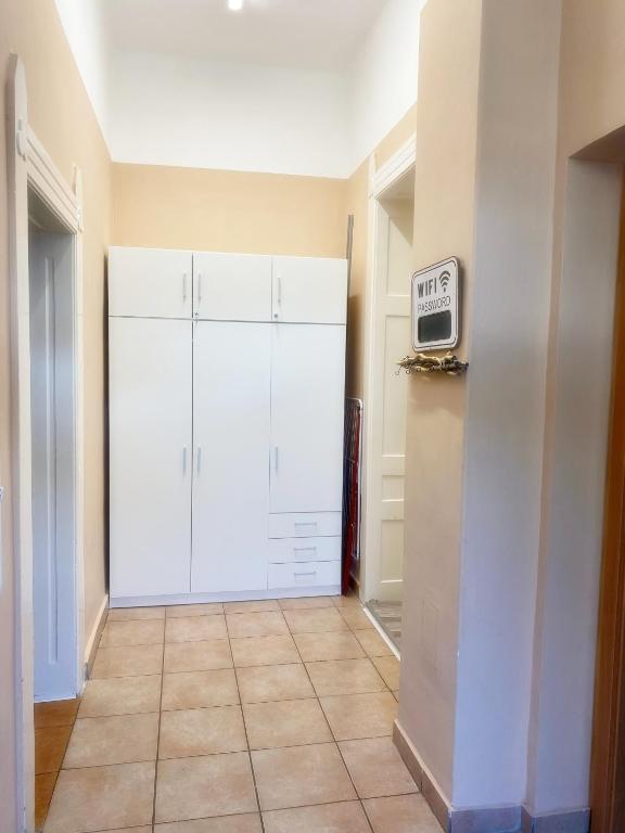 Televízia a/alebo spoločenská miestnosť v ubytovaní Pihi-Lak Apartman Siófok