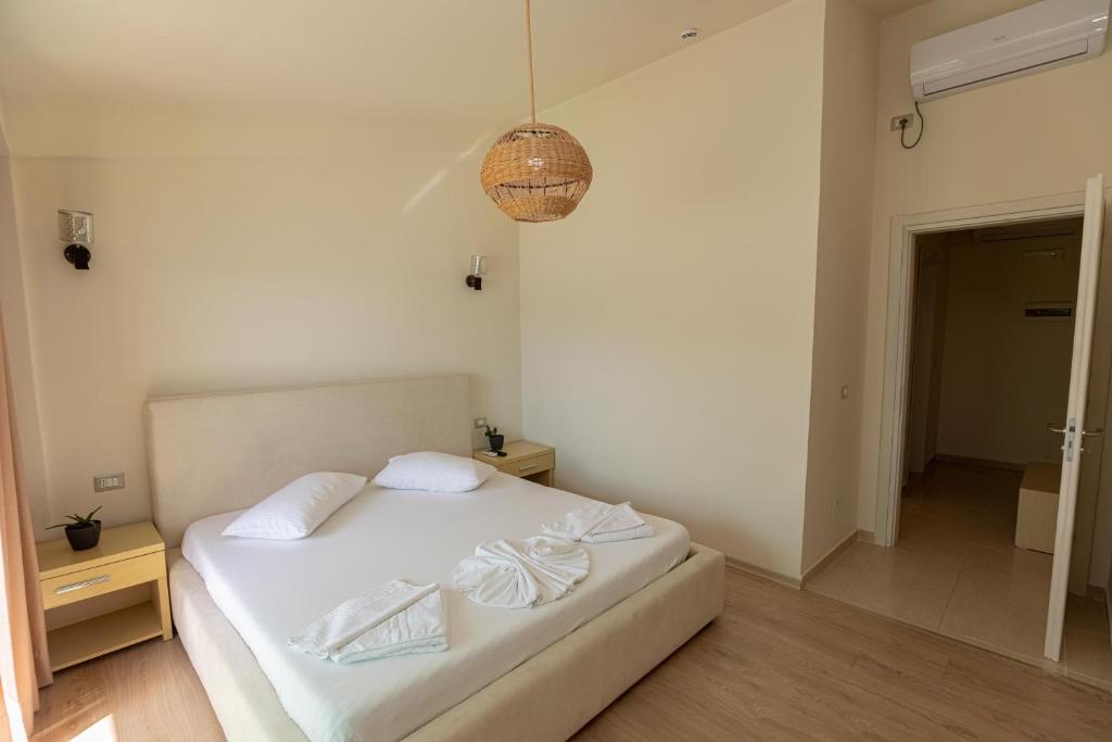 Postel nebo postele na pokoji v ubytování Hotel Picasso