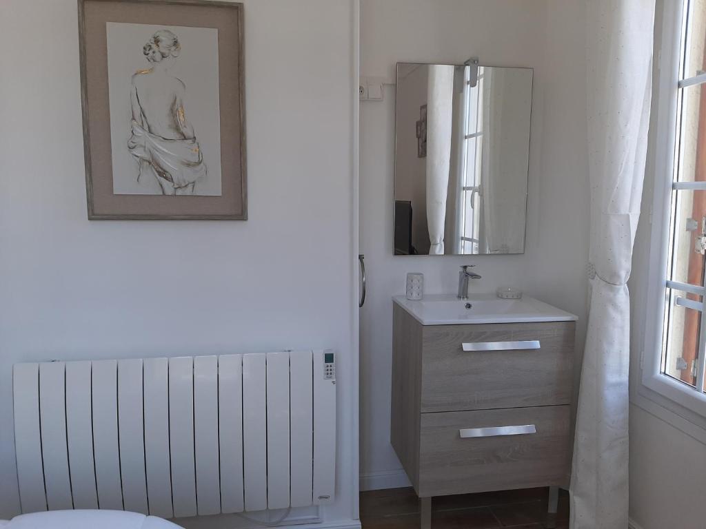 Koupelna v ubytování Au gré des marées, appartement face à la mer, classé 3 étoiles