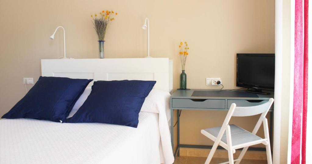 Posteľ alebo postele v izbe v ubytovaní APARTAMENTO LAS PALMERILLAS-RESIDENCIAL TORREQUEBRADA