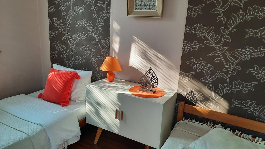 Postel nebo postele na pokoji v ubytování Apartmani RALE rooms