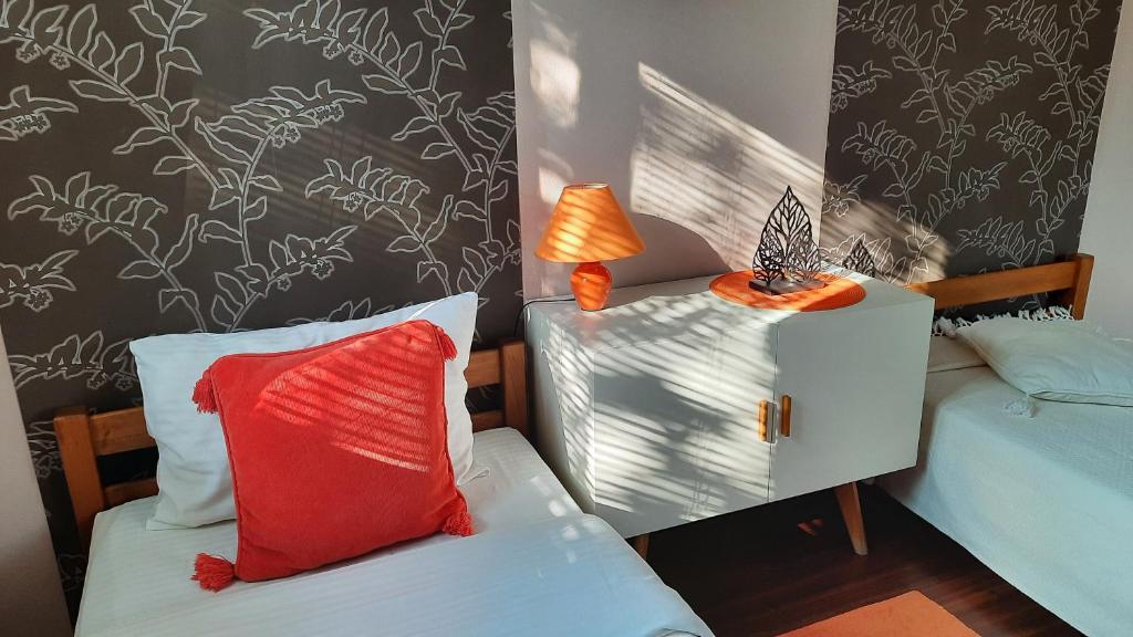 Postel nebo postele na pokoji v ubytování Apartmani RALE rooms