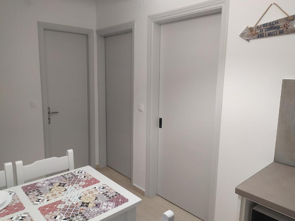 Postel nebo postele na pokoji v ubytování Valentinos Apartments
