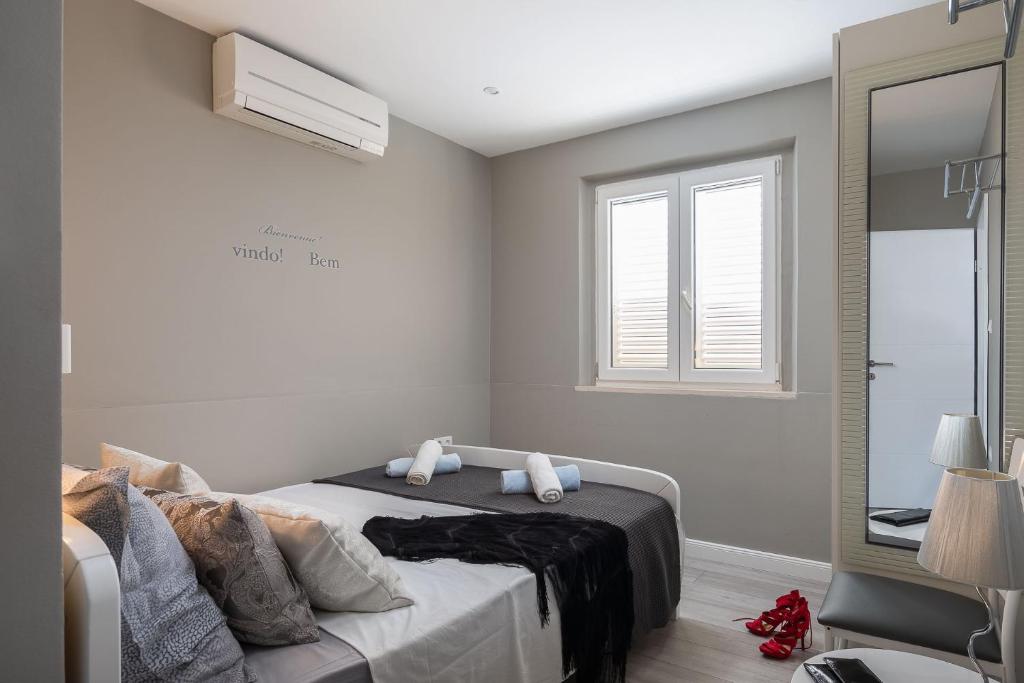 Łóżko lub łóżka w pokoju w obiekcie Appartements Banya