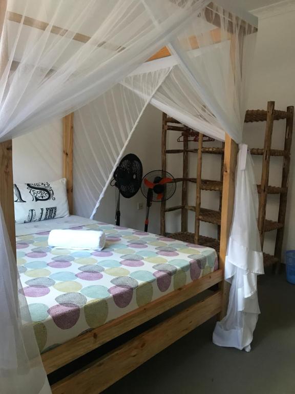 Hakuna Matata Guest Houseにあるベッド