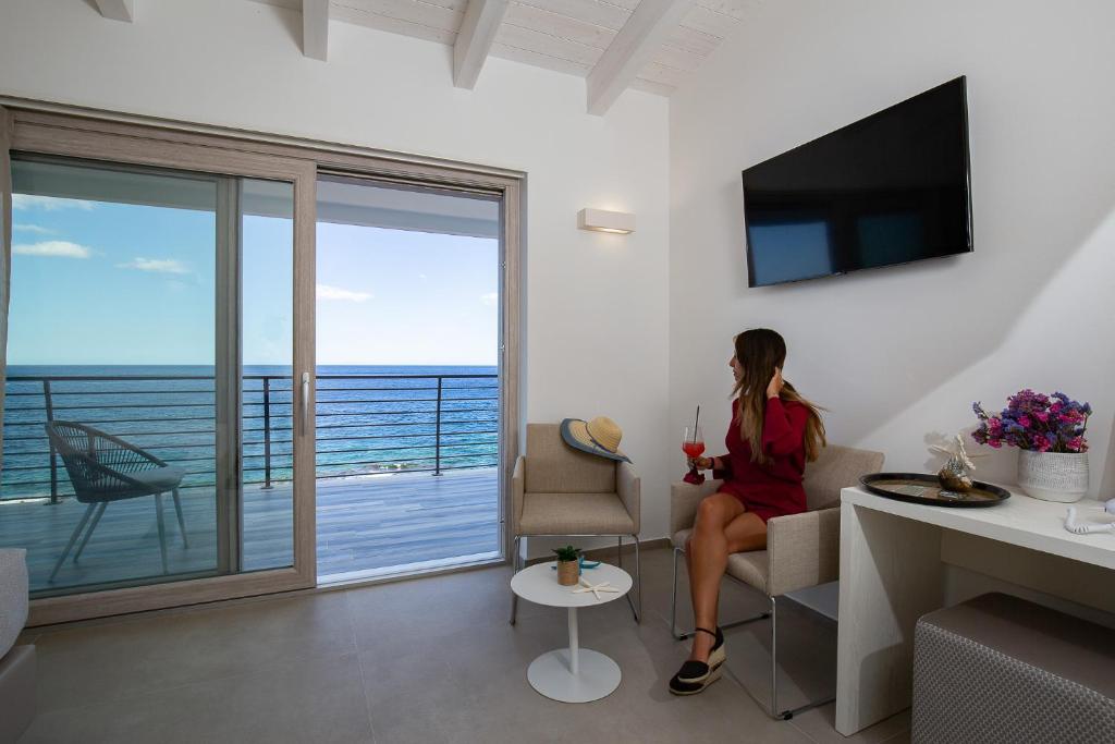 TV a/nebo společenská místnost v ubytování Hotel Caramare