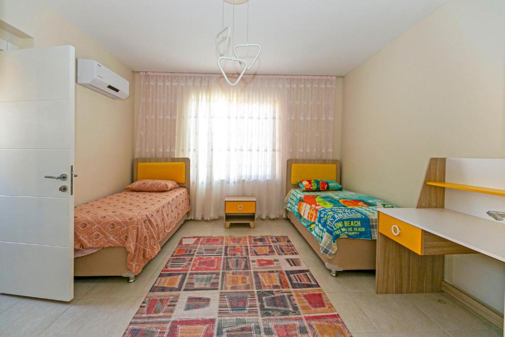 Postel nebo postele na pokoji v ubytování Paradise Town Villa Beliza
