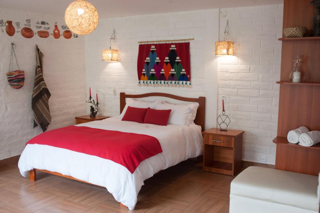 Postel nebo postele na pokoji v ubytování La Floresta Hotel