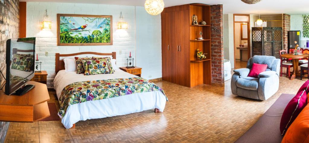 Postel nebo postele na pokoji v ubytování La Floresta Hotel