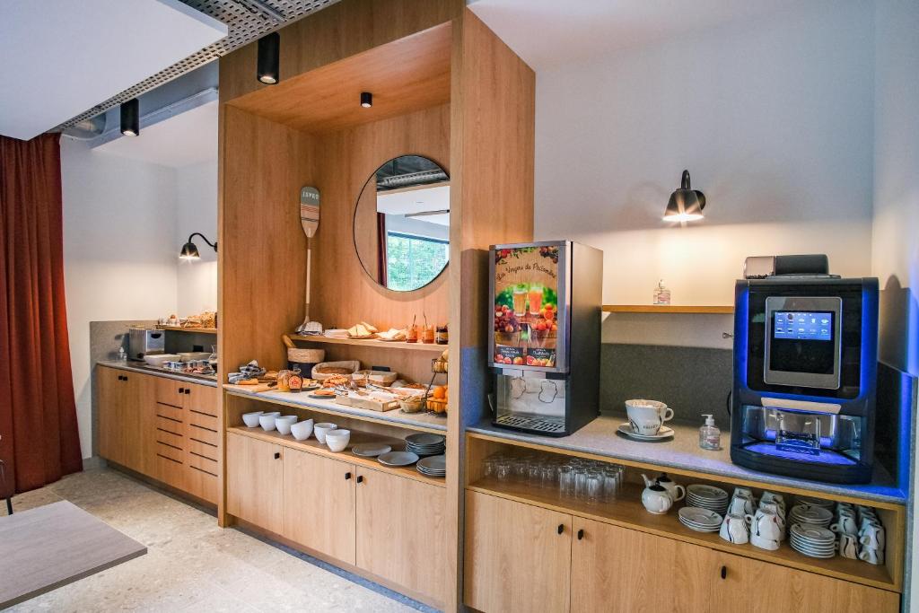 Kuchyň nebo kuchyňský kout v ubytování ibis Styles Albertville