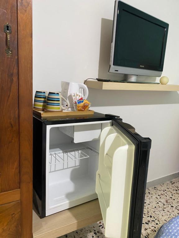 A television and/or entertainment centre at B&B Rifugio Angelina