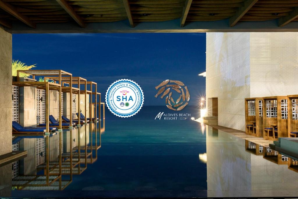 Bazén v ubytování Maldives Beach Resort nebo v jeho okolí