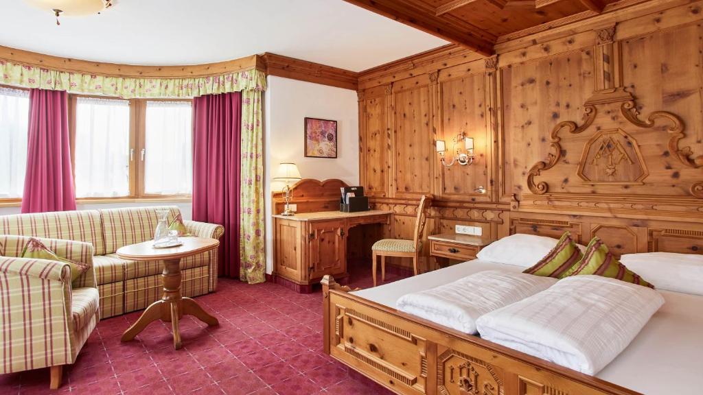 Ein Bett oder Betten in einem Zimmer der Unterkunft All In Resort Schwarzbrunn - 4 Sterne Superior