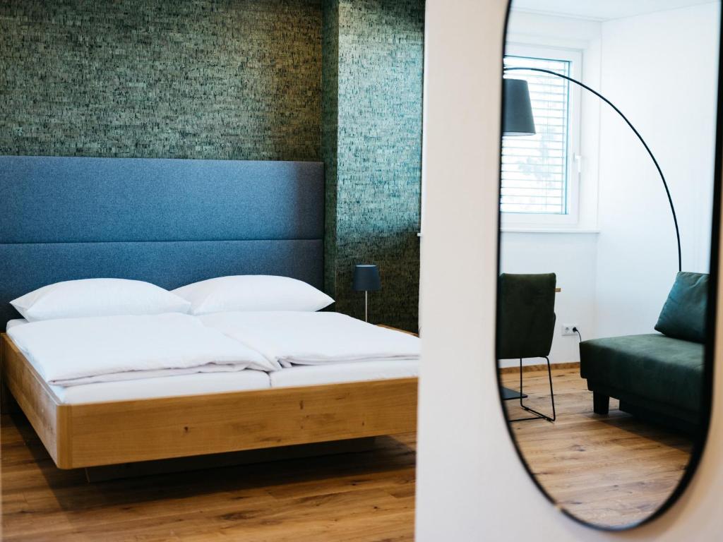 Posteľ alebo postele v izbe v ubytovaní Weingut Straka