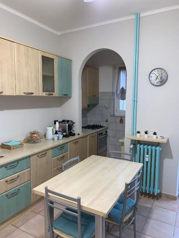Kuchyň nebo kuchyňský kout v ubytování BEAUTIFUL APARTMENT a due passi dal centro