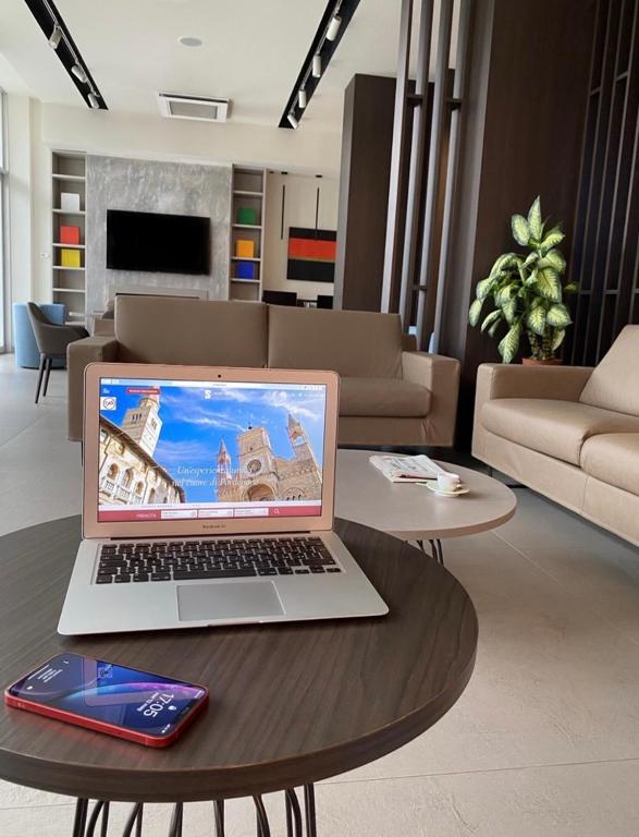 TV a/nebo společenská místnost v ubytování Hotel Santin