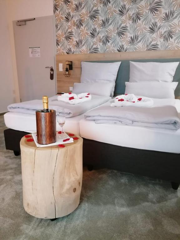 Postel nebo postele na pokoji v ubytování Hotel Le Filou
