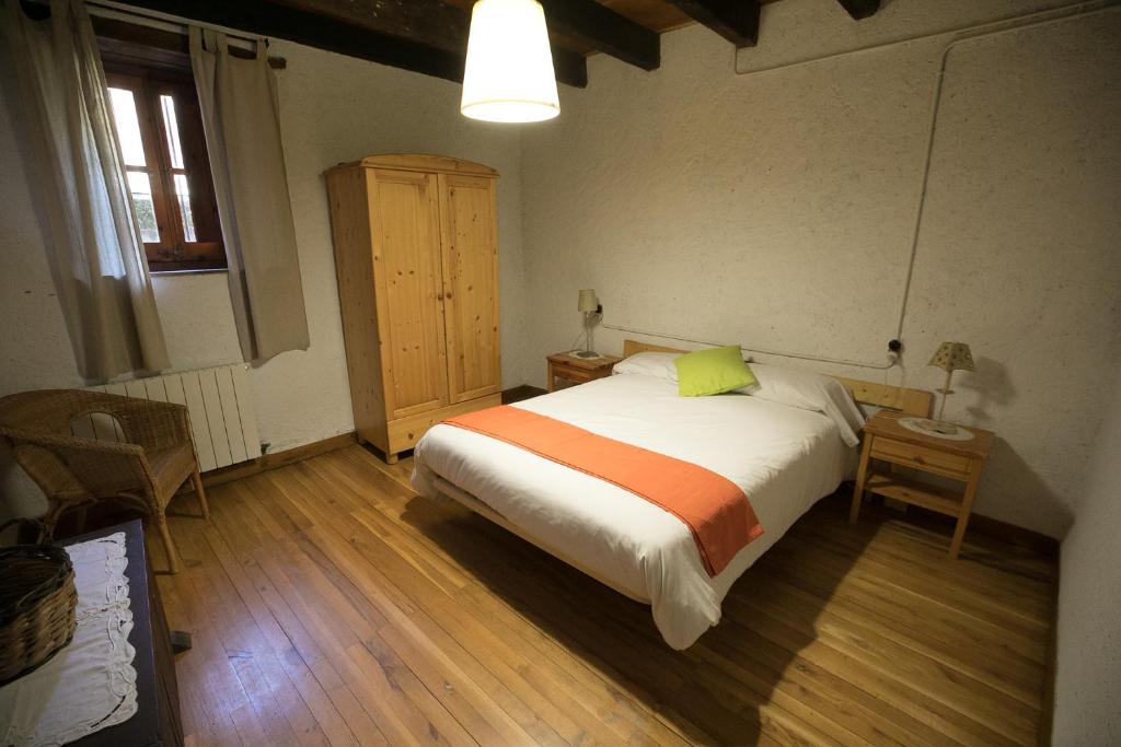 Postel nebo postele na pokoji v ubytování El Buxaus de la Muntanya