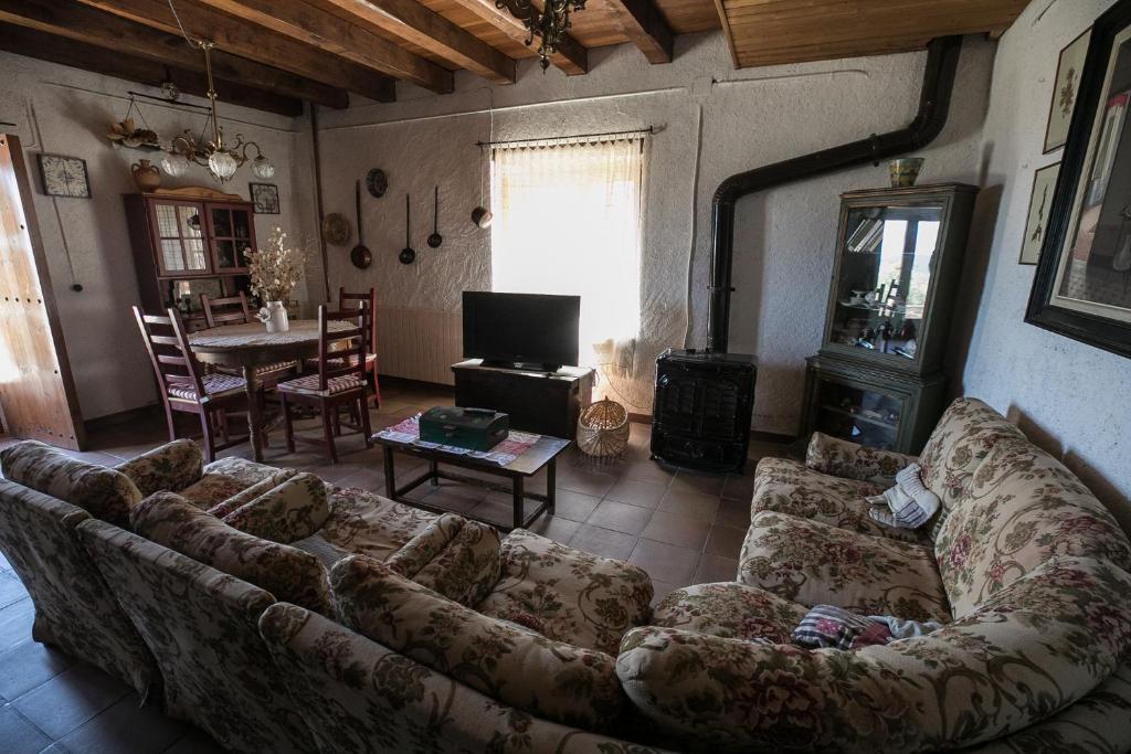 Posezení v ubytování El Buxaus de la Muntanya