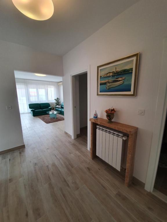 Postel nebo postele na pokoji v ubytování Apartment Tina