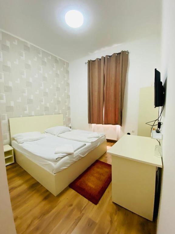 Postel nebo postele na pokoji v ubytování Easy Star Hotel
