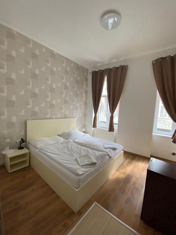 Postel nebo postele na pokoji v ubytování Easy Star Hotel