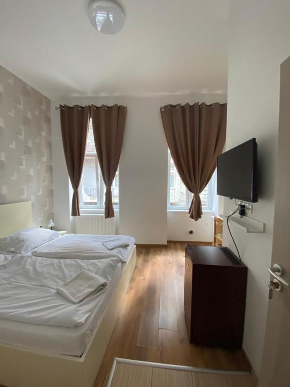 Postel nebo postele na pokoji v ubytování Easy Star Hotel