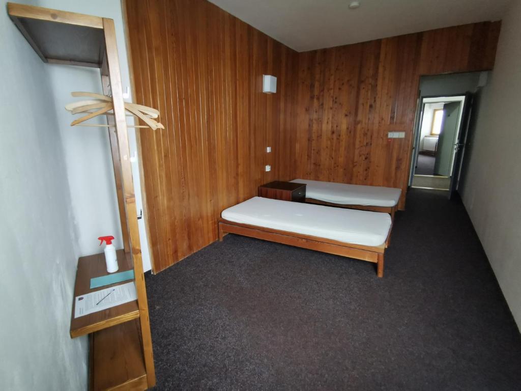 Postel nebo postele na pokoji v ubytování Hotel Labská bouda