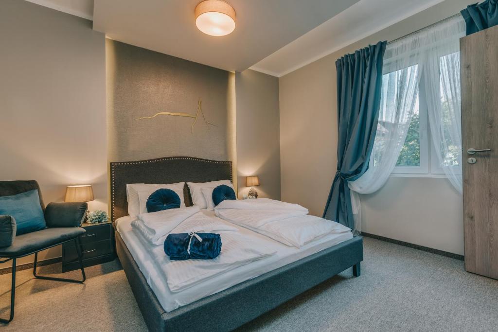 Postel nebo postele na pokoji v ubytování Villa17