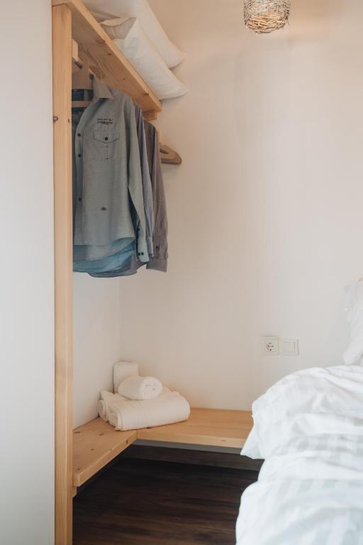 Postel nebo postele na pokoji v ubytování Votsalo Cozy Apartments