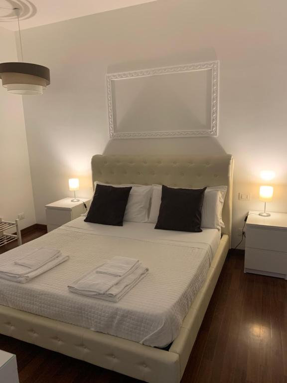 Postel nebo postele na pokoji v ubytování BeB L'ALLORO