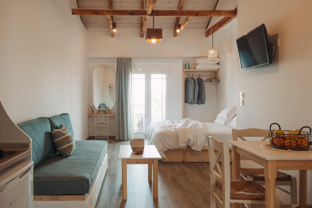 TV a/nebo společenská místnost v ubytování Votsalo Cozy Apartments