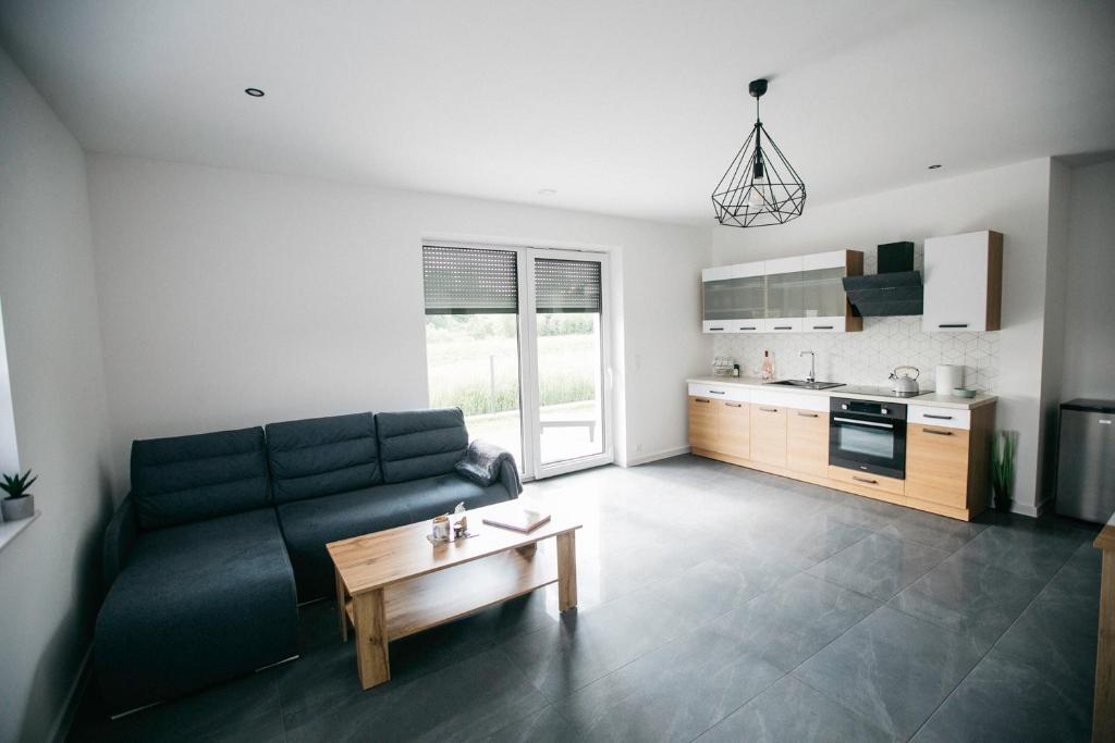 Kuchyňa alebo kuchynka v ubytovaní Apartamenty Perła Orawy