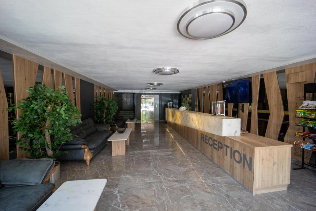 TV a/nebo společenská místnost v ubytování Hotel Caesar 2